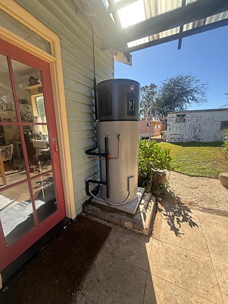 2 new ambiheat installed replacing old hot water system leaning off wall